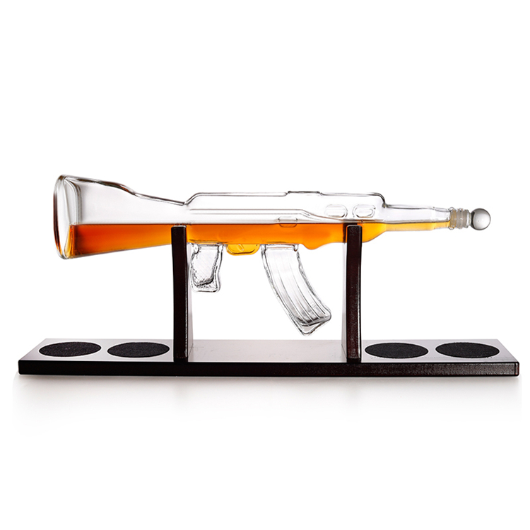 Custom special design 500ml 700ml 750ml transparent brandy spirit vodka AK 47 gun shaped liquor bottle
