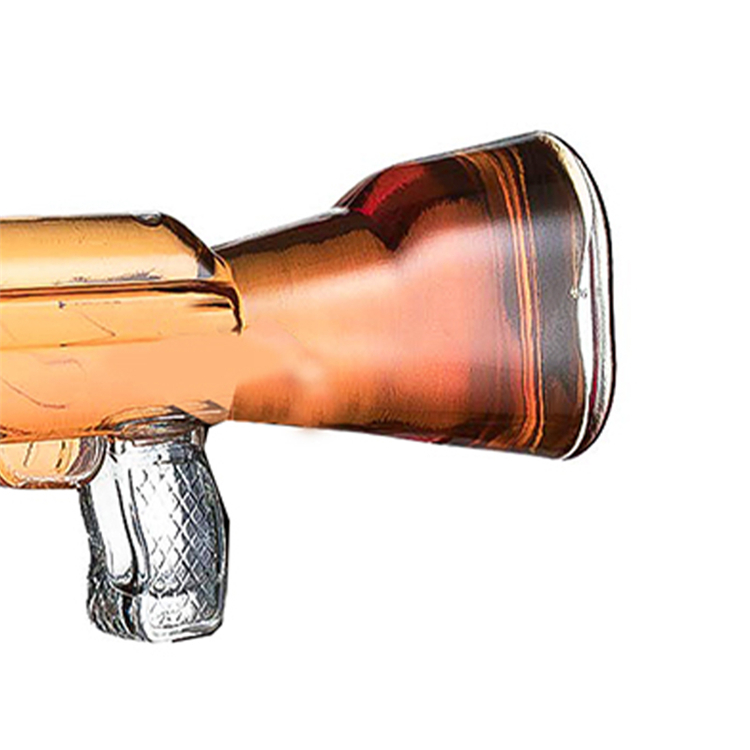Custom special design 500ml 700ml 750ml transparent brandy spirit vodka AK 47 gun shaped liquor bottle