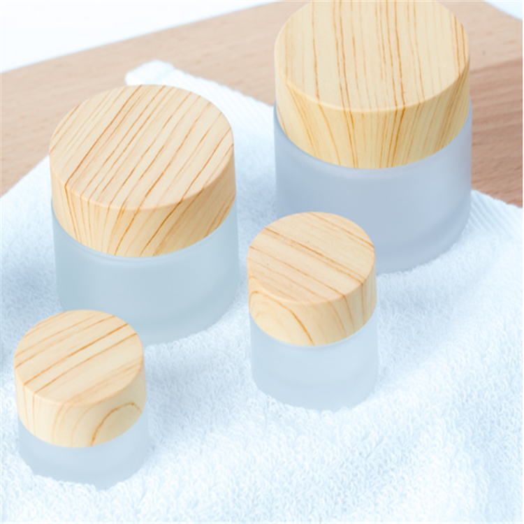 Customizable Frosted Glass Cosmetic Bottle With Wooden Lid cosmetic cream glass bottle