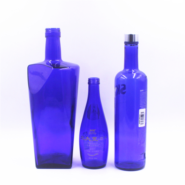 Customize 330ml 500ml 750ml screen printing embossed logo empty spirits vodka liquor tequila gin blue screw cap glass bottle