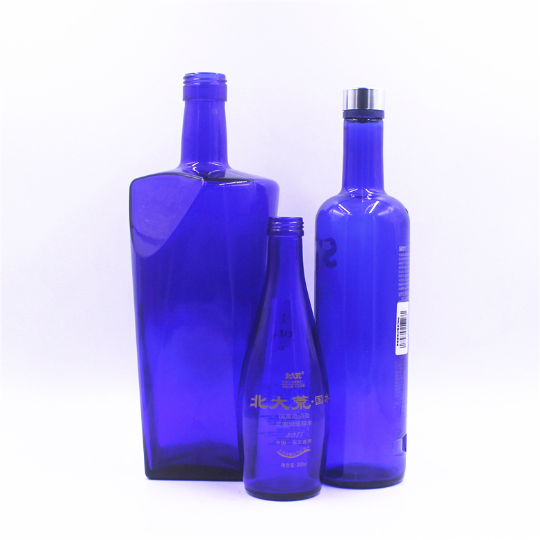 Customize 330ml 500ml 750ml screen printing embossed logo empty spirits vodka liquor tequila gin blue screw cap glass bottle