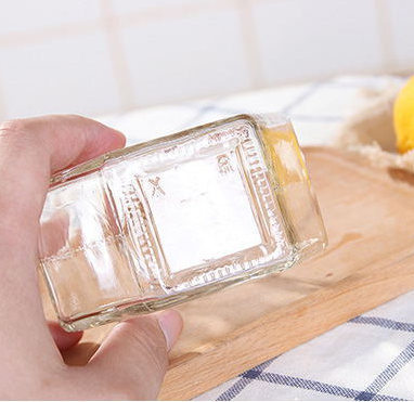 Customize Multiple Capacity100ml 180ml 280ml 380ml Hexagonal Glass Jar Packaging with Lids