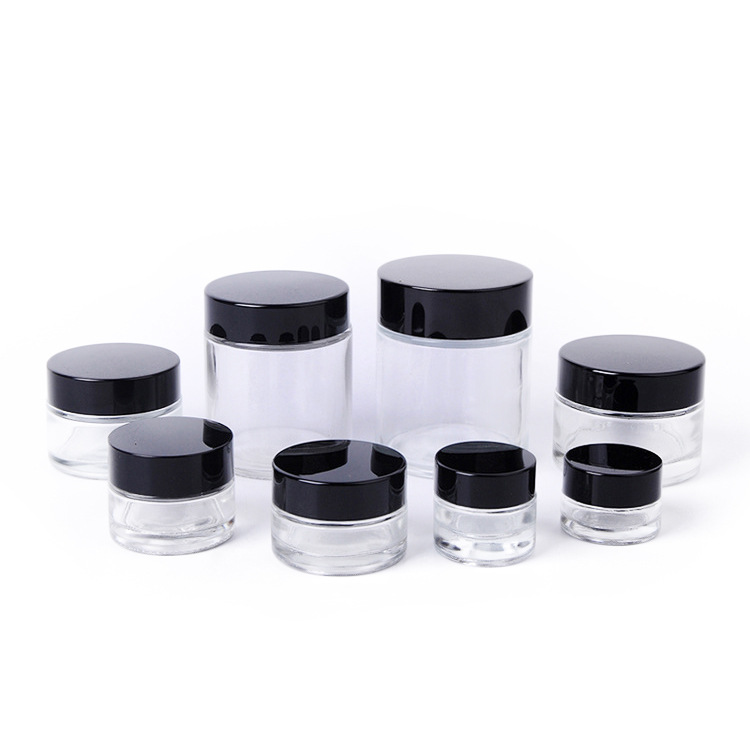 Customized 100g clear amber glass bottle cosmetic cream jar with black lids