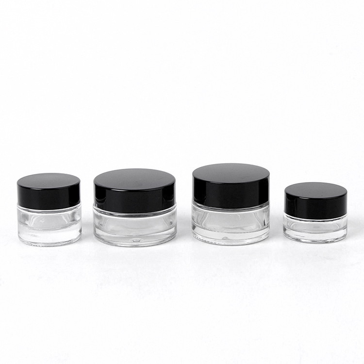Customized 100g clear amber glass bottle cosmetic cream jar with black lids