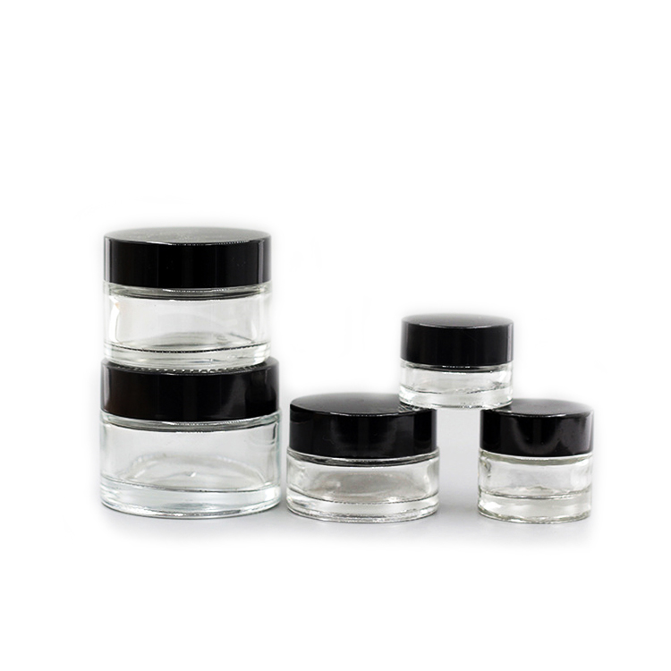 Customized 100g clear amber glass bottle cosmetic cream jar with black lids
