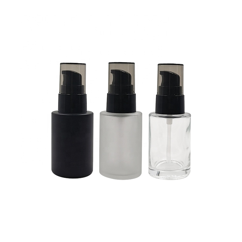 Customized 20ml 30ml 40ml 50ml round flat shoulder empty glass massage oil bottle with black pump sprayer