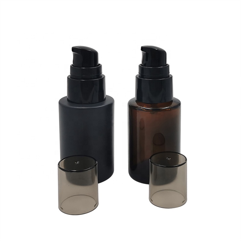 Customized 20ml 30ml 40ml 50ml round flat shoulder empty glass massage oil bottle with black pump sprayer