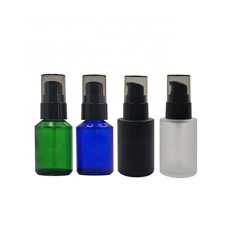 Customized 20ml 30ml 40ml 50ml round flat shoulder empty glass massage oil bottle with black pump sprayer