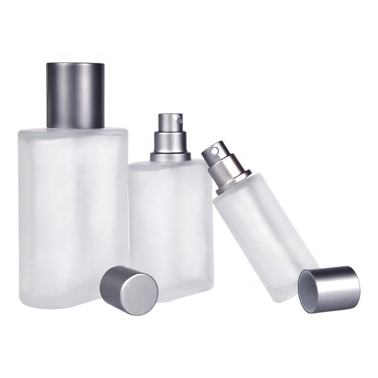 Customized 30ml 50ml 100ml colored stock empty perfume glass spray bottle