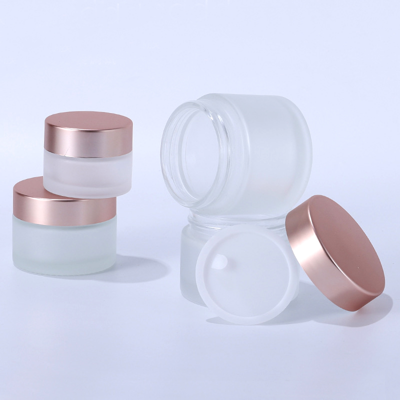 Customized 50g straight side matte frosted cosmetic bottle weed packaging smellproof container CBD glass jar with rose good caps