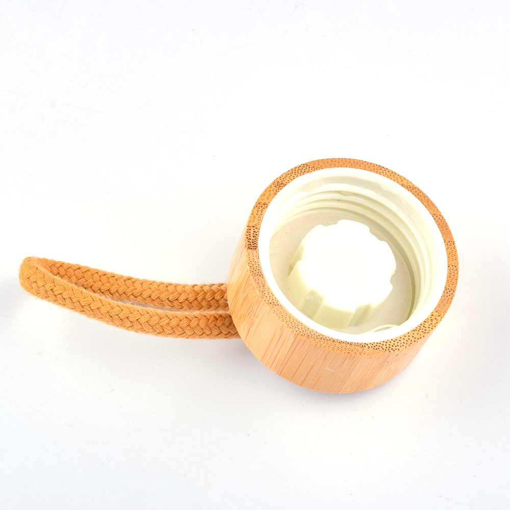 Customized Bpa Free 17Oz Bamboo Lid Reusable Glass Water Bottle With Protective Silicone Sleeve