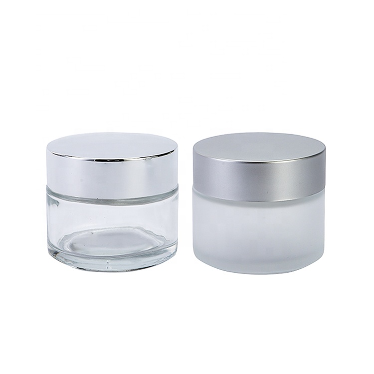 Customized Luxury GlassJar With Shiny Silver Lid 100ml Empty Clear Glass Jar For Creams And Lotions