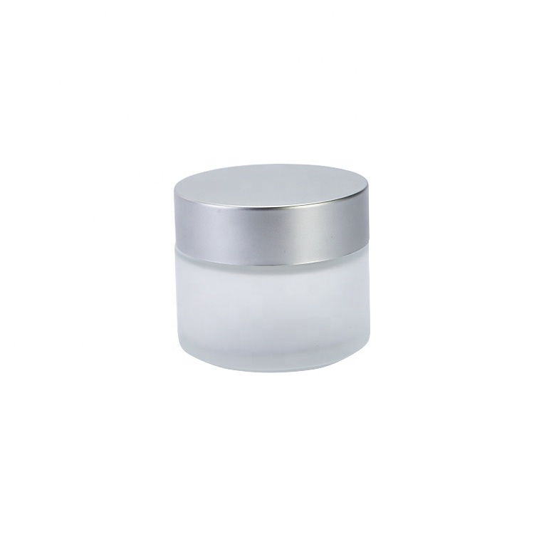 Customized Luxury GlassJar With Shiny Silver Lid 100ml Empty Clear Glass Jar For Creams And Lotions