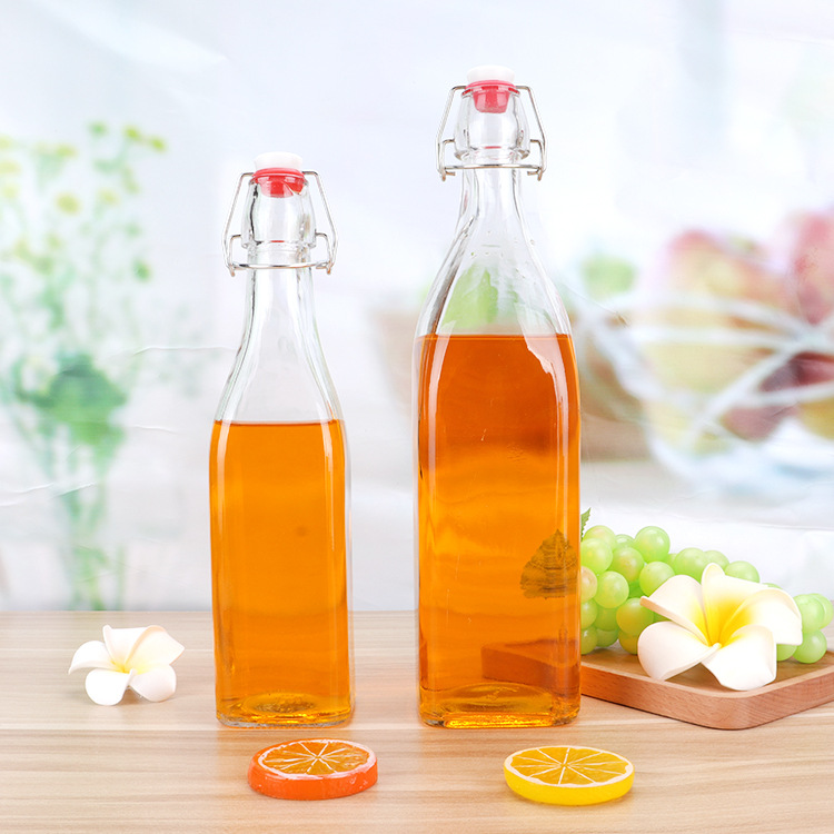 Customized Premium Quality Different Size Sealed Beverage Glass Storage Bottles with Clip Top
