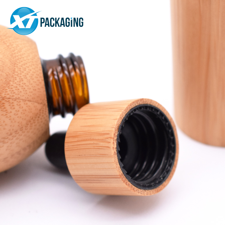 Customized bamboo coated glass dropper bottle for CBD oil child resistant dropper bottle 30ml