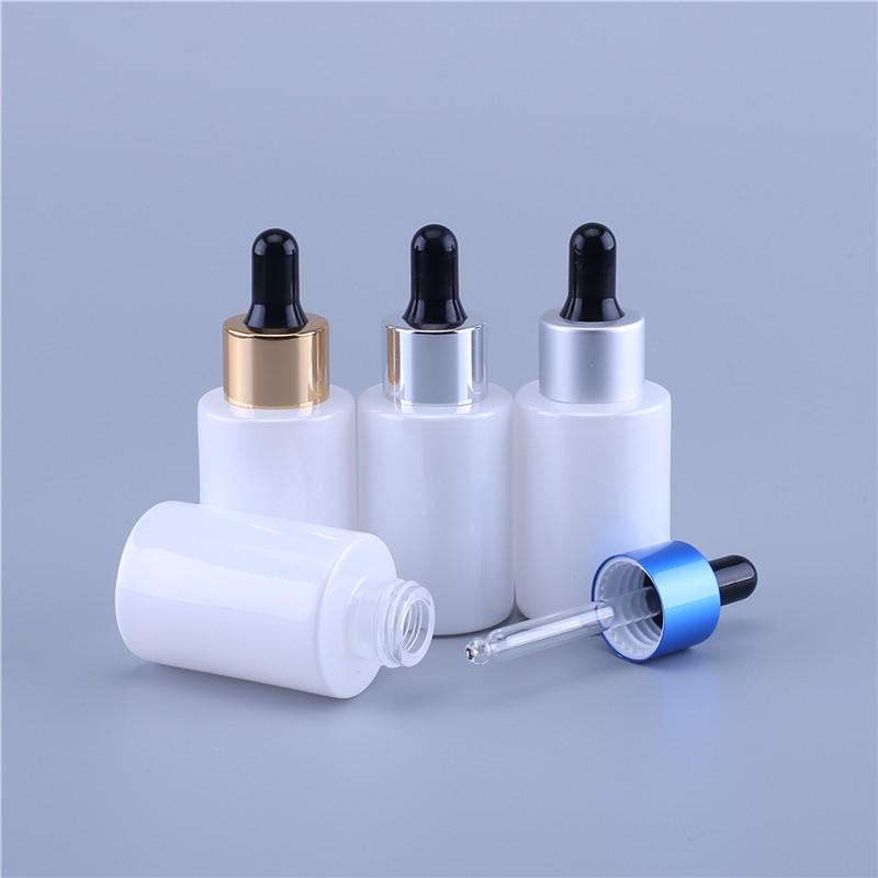 Customized cosmetic 1oz 30ml glass serum bottle flat shoulder cylinder dropper bottle