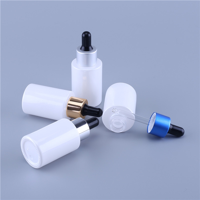 Customized cosmetic 1oz 30ml glass serum bottle flat shoulder cylinder dropper bottle