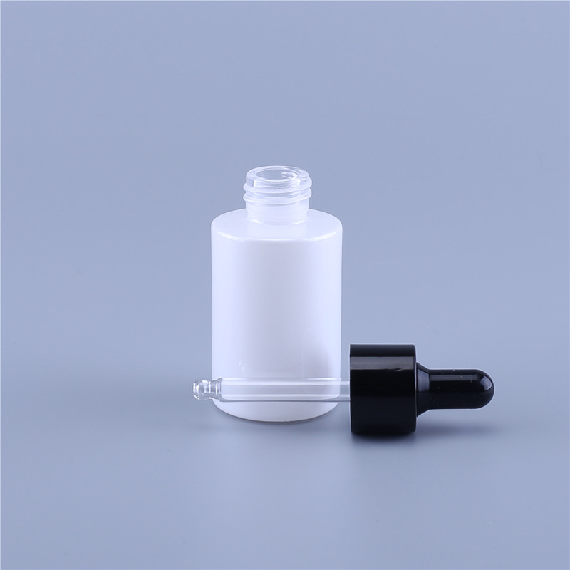 Customized cosmetic 1oz 30ml glass serum bottle flat shoulder cylinder dropper bottle