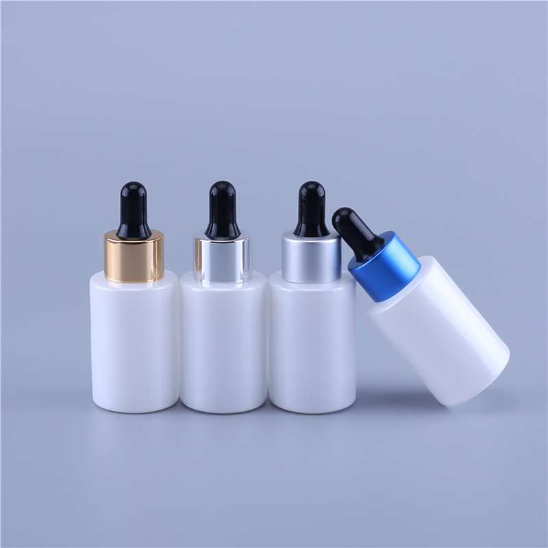 Customized cosmetic 1oz 30ml glass serum bottle flat shoulder cylinder dropper bottle
