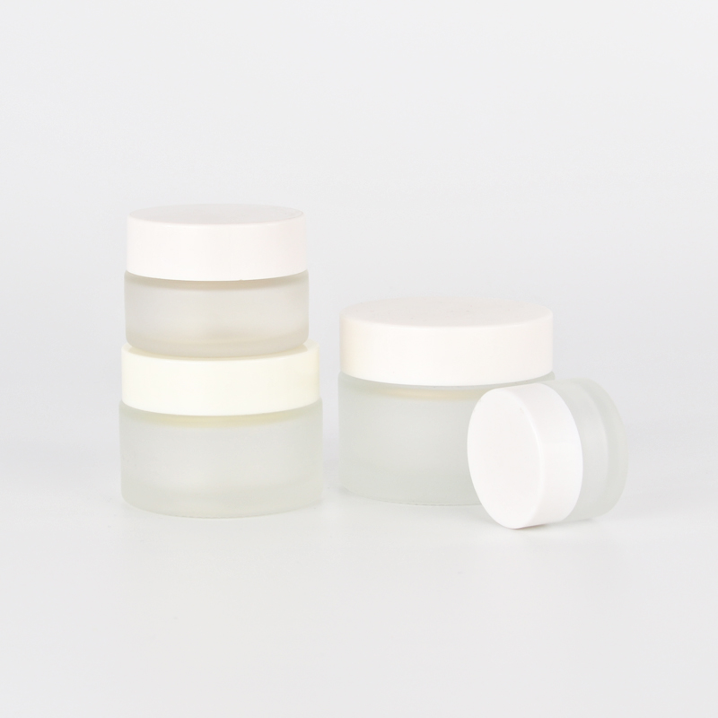 Customized cosmetic glass cream jar 5m,7ml,10ml,20ml,30ml,50ml,100ml glass clear frosted jar for cream