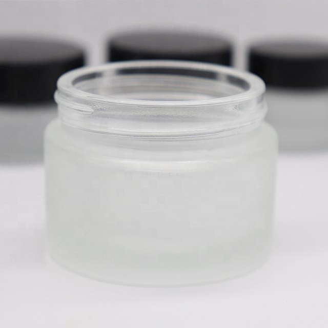 Customized frosted clear glass bottle for cosmetic cream jars