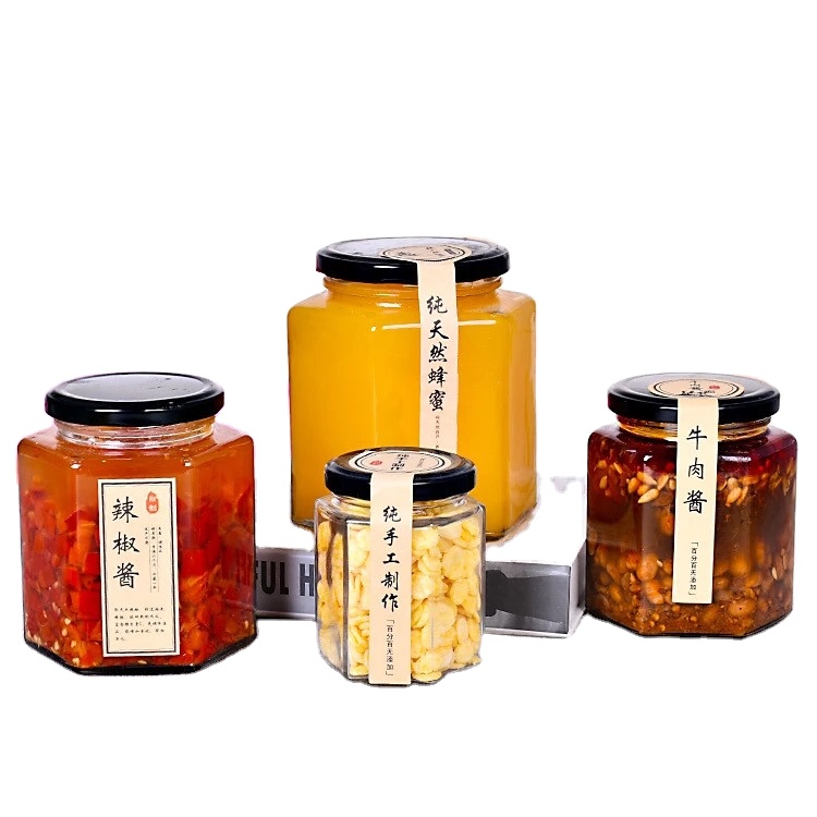 Customized logo 280ml 380ml 500ml 730ml clear empty hexagon glass honey chili sauce jam jar with metal lid