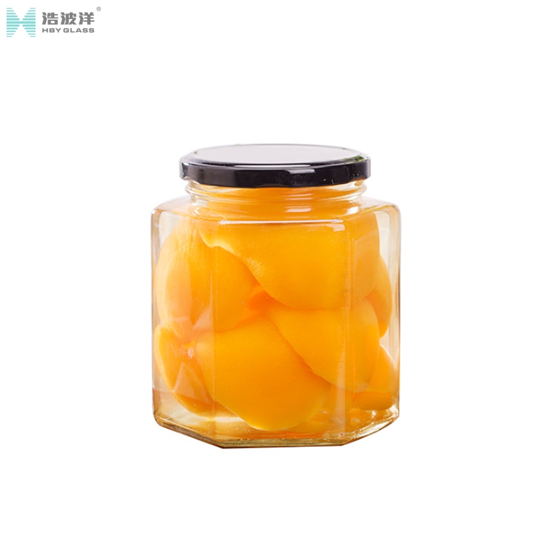 Customized logo 280ml 380ml 500ml hexagonal honey glass jar with metal screw lid