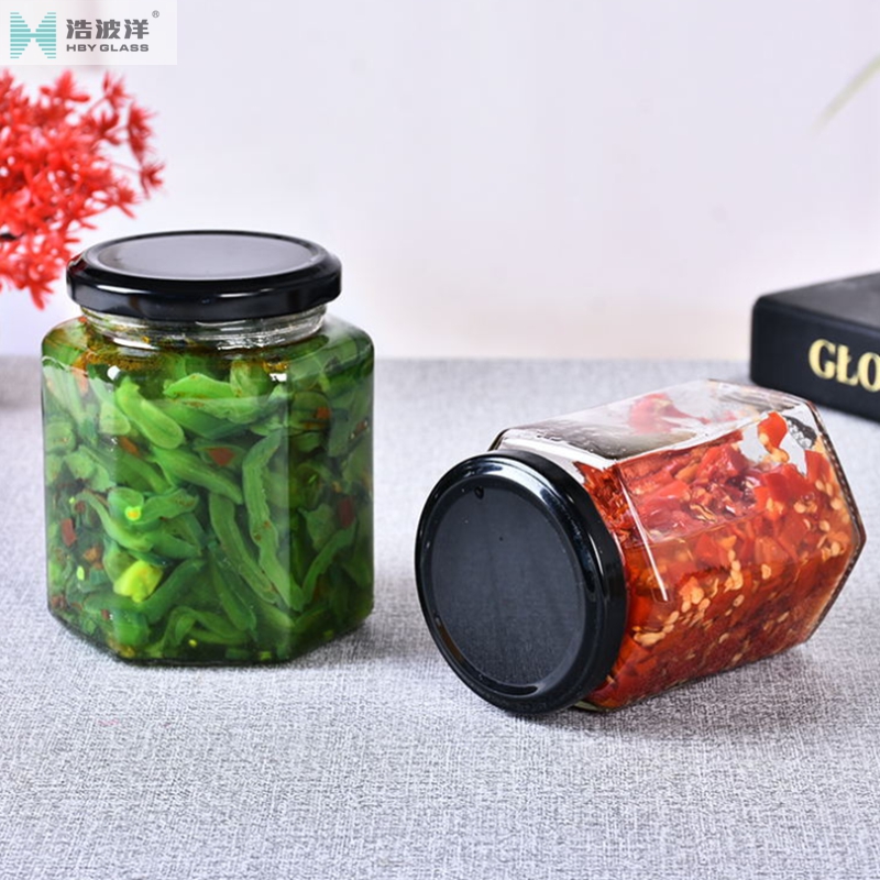 Customized logo 280ml 380ml 500ml hexagonal honey glass jar with metal screw lid