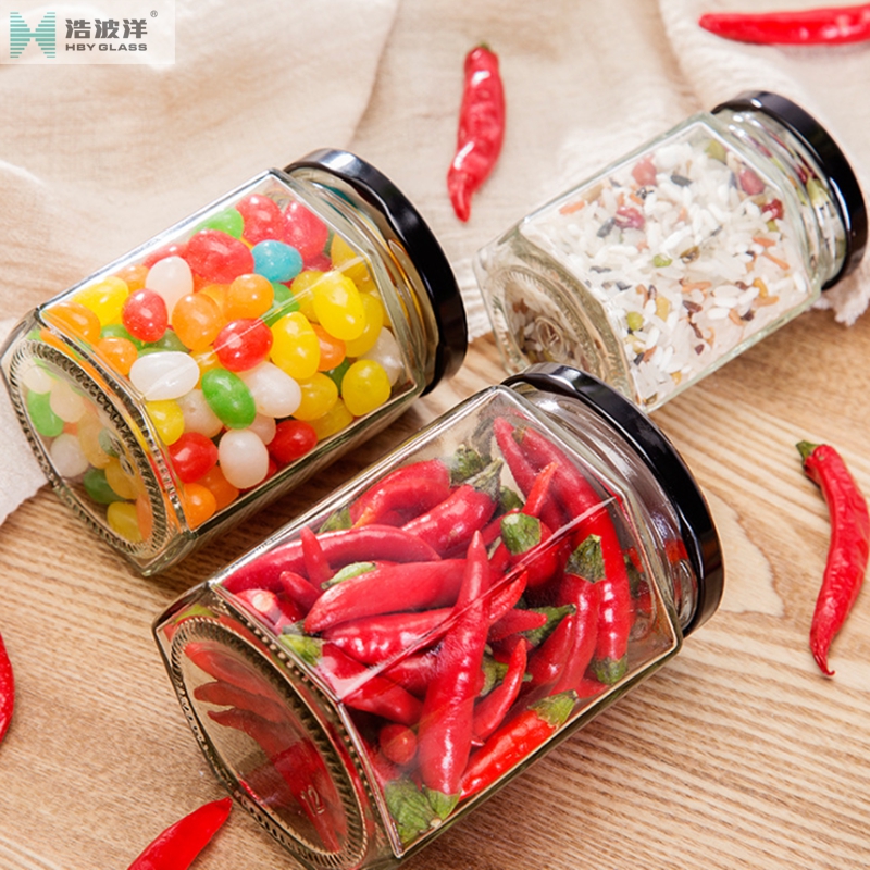 Customized logo 280ml 380ml 500ml hexagonal honey glass jar with metal screw lid