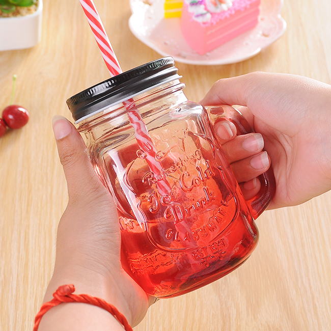 Customized logo Embossed glass mason jars with handle and Screw glass beverage bottles