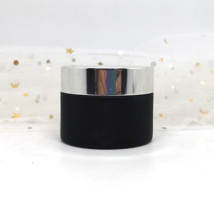 Customized logo child proof lid CBD cream container black glass jar with childproof cap