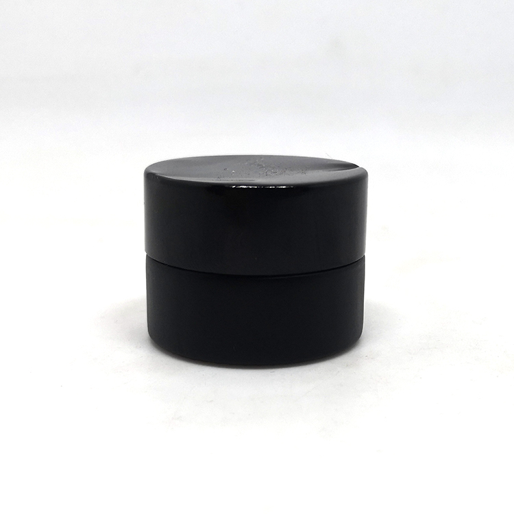 Customized logo child proof lid CBD cream container black glass jar with childproof cap
