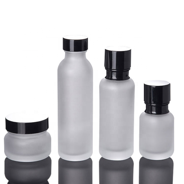 Customs logo high quality Cosmetic Frosted glass bottle and jars with black caps frosted glass jars with good price