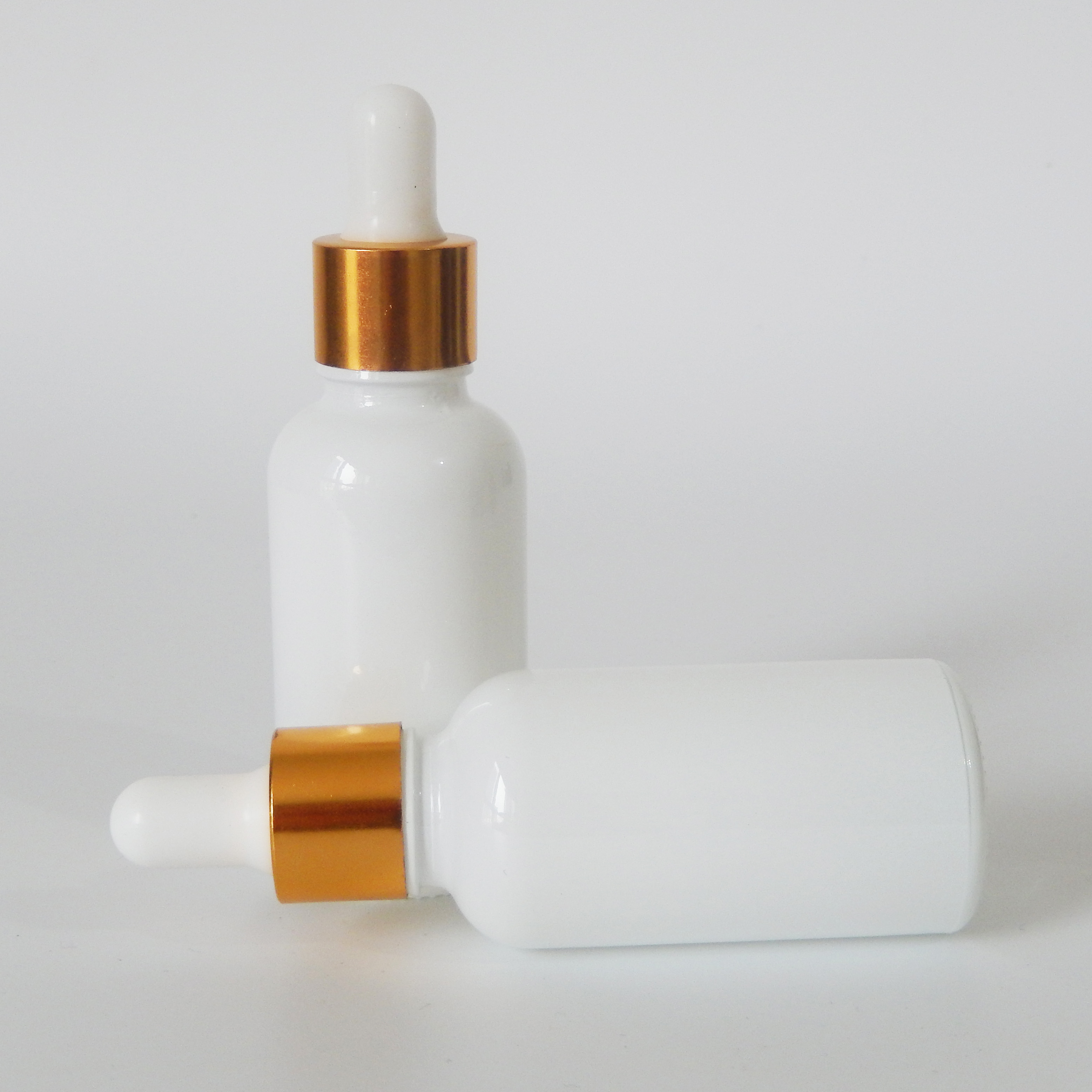 Cylinder 30ml shiny white glass serum cosmetic dropper bottle with gold aluminum screw cap