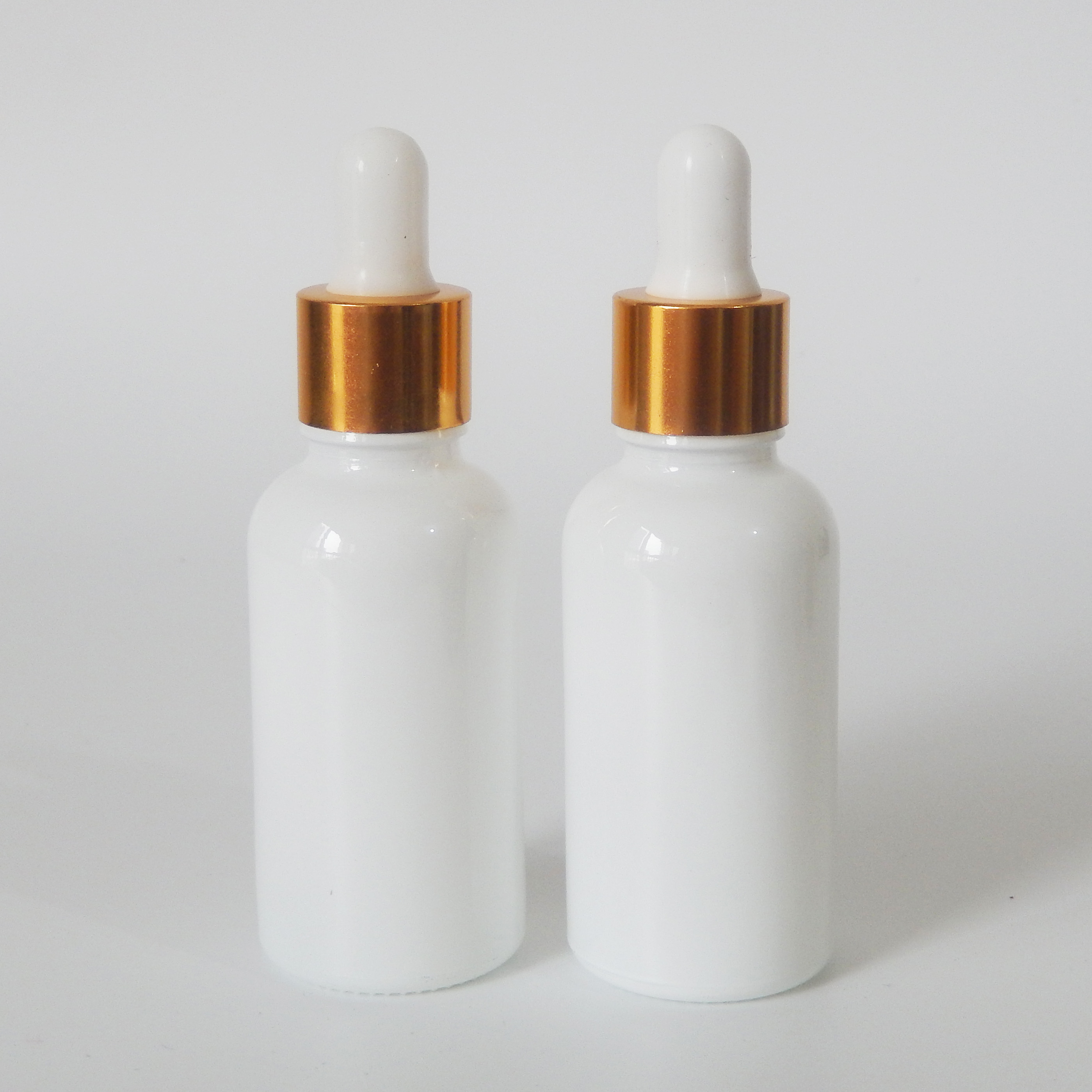 Cylinder 30ml shiny white glass serum cosmetic dropper bottle with gold aluminum screw cap
