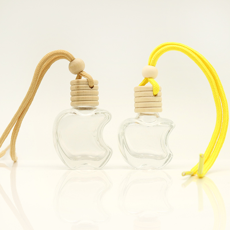 DFG10004 5ml 8ml 10ml clear color apple shape hanging rope wooden cap glass car perfume bottle