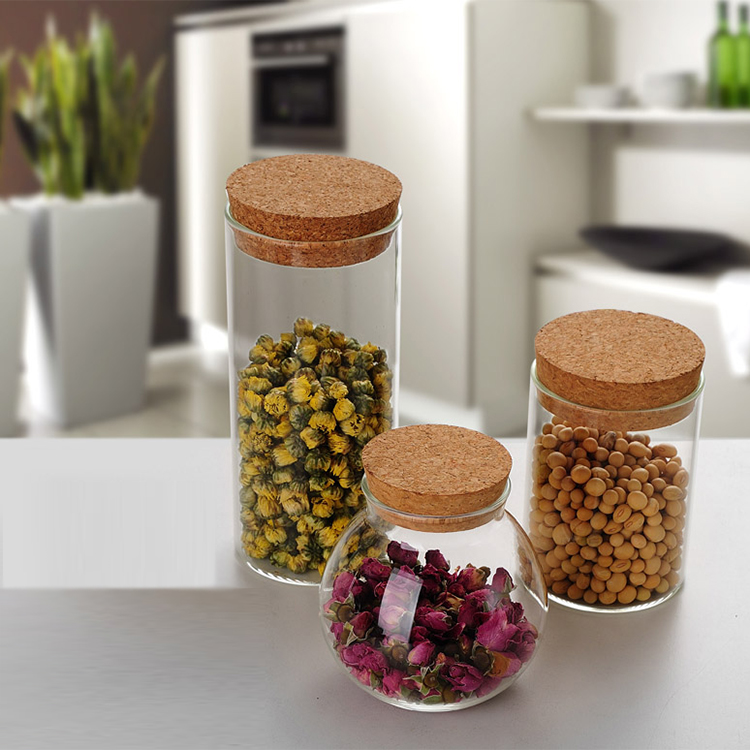 Delicate round glass storage bottle with cork cover