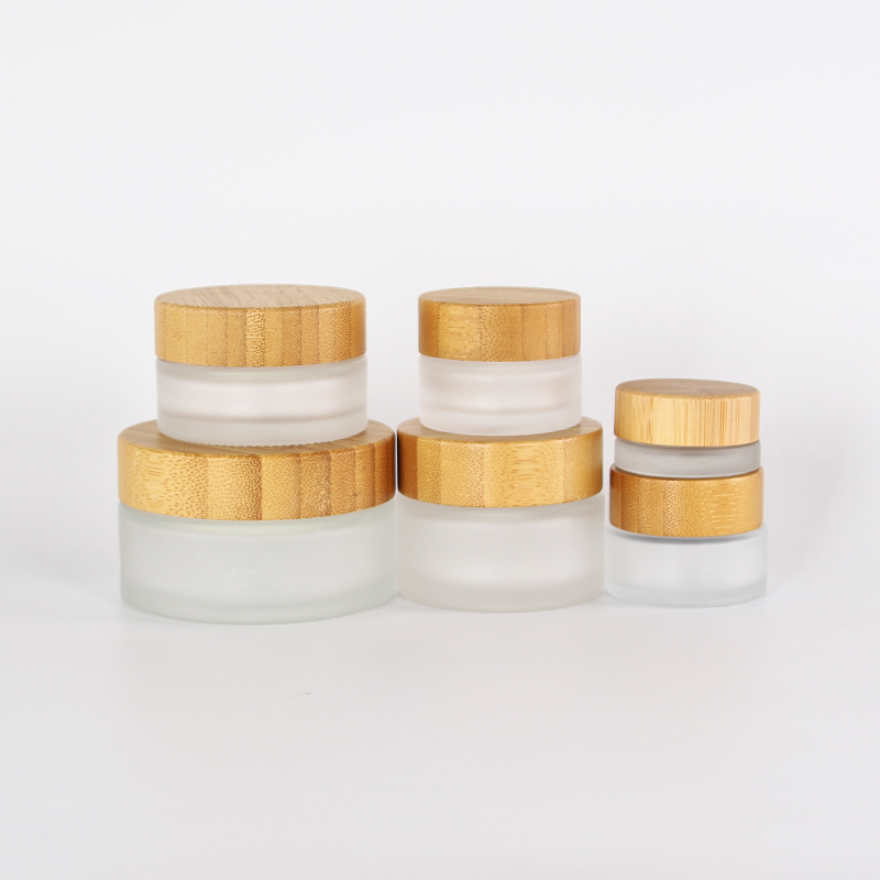 Different capacities for  frosted glass jar with engraving bamboo lids for cosmetic packaging
