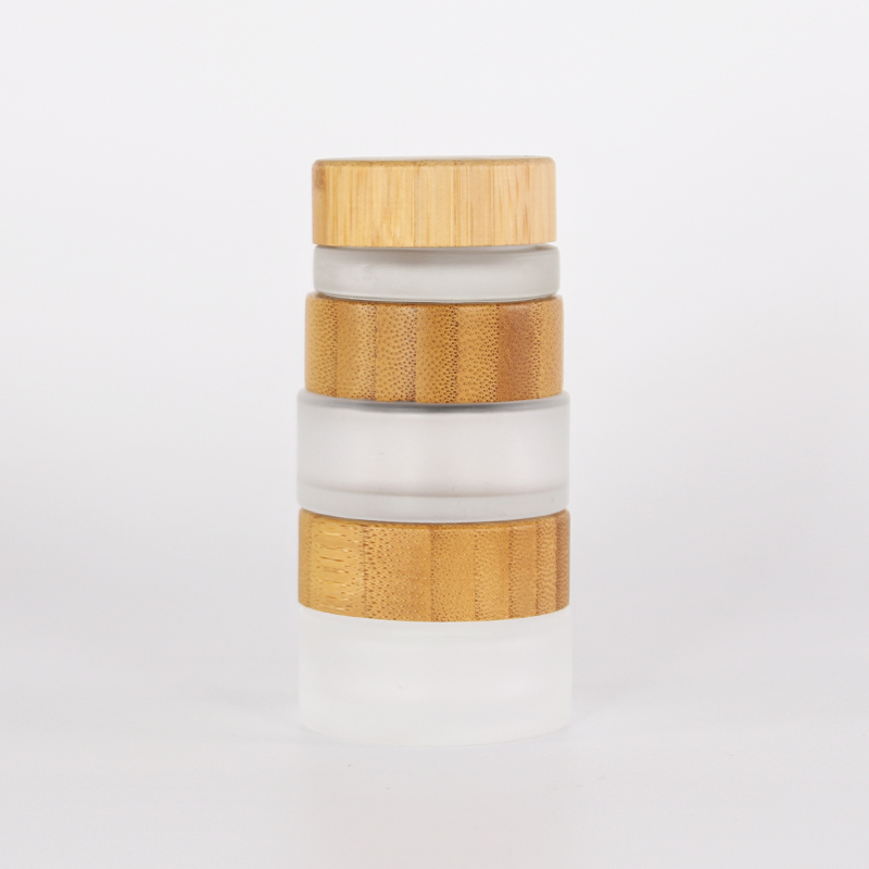 Different capacities for frosted glass jar with engraving bamboo lids for cosmetic packaging