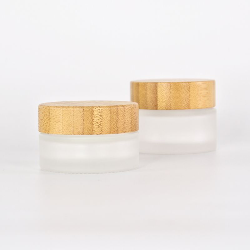 Different capacities for frosted glass jar with engraving bamboo lids for cosmetic packaging
