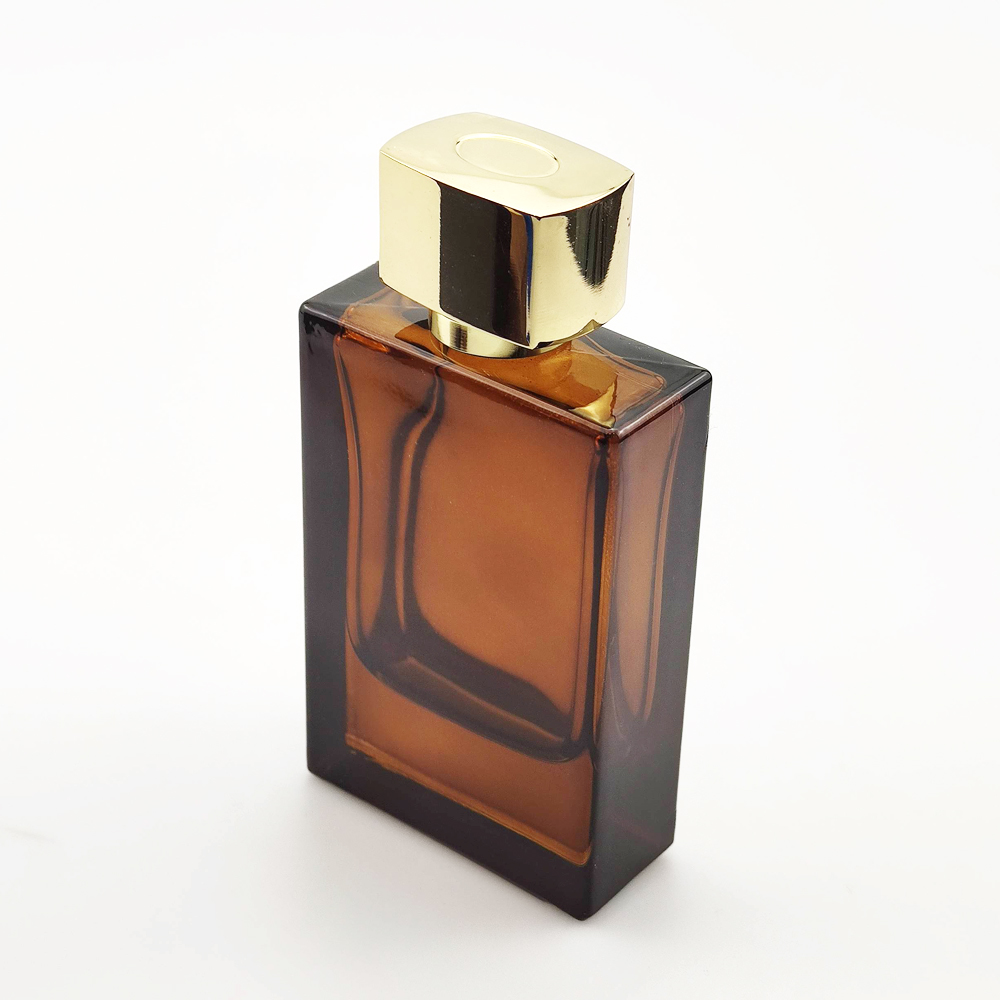 Dongguan factory wholesale low MOQ luxury amber colored spray glass perfume bottle with shiny gold zamak cap