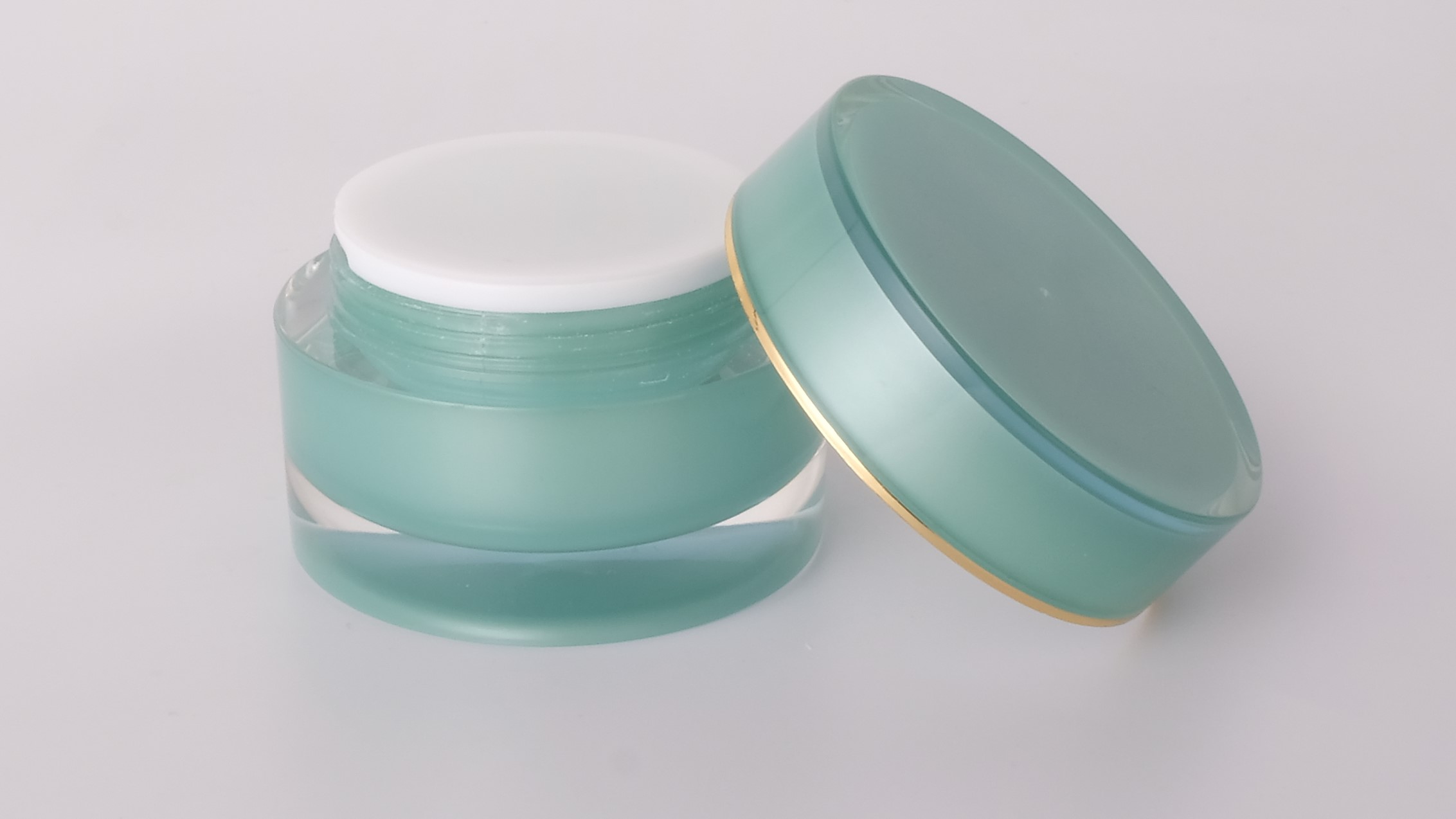 E12 50g in stock ready to ship gold plated lid mint green round empty acrylic plastic basic cosmetic cream jar