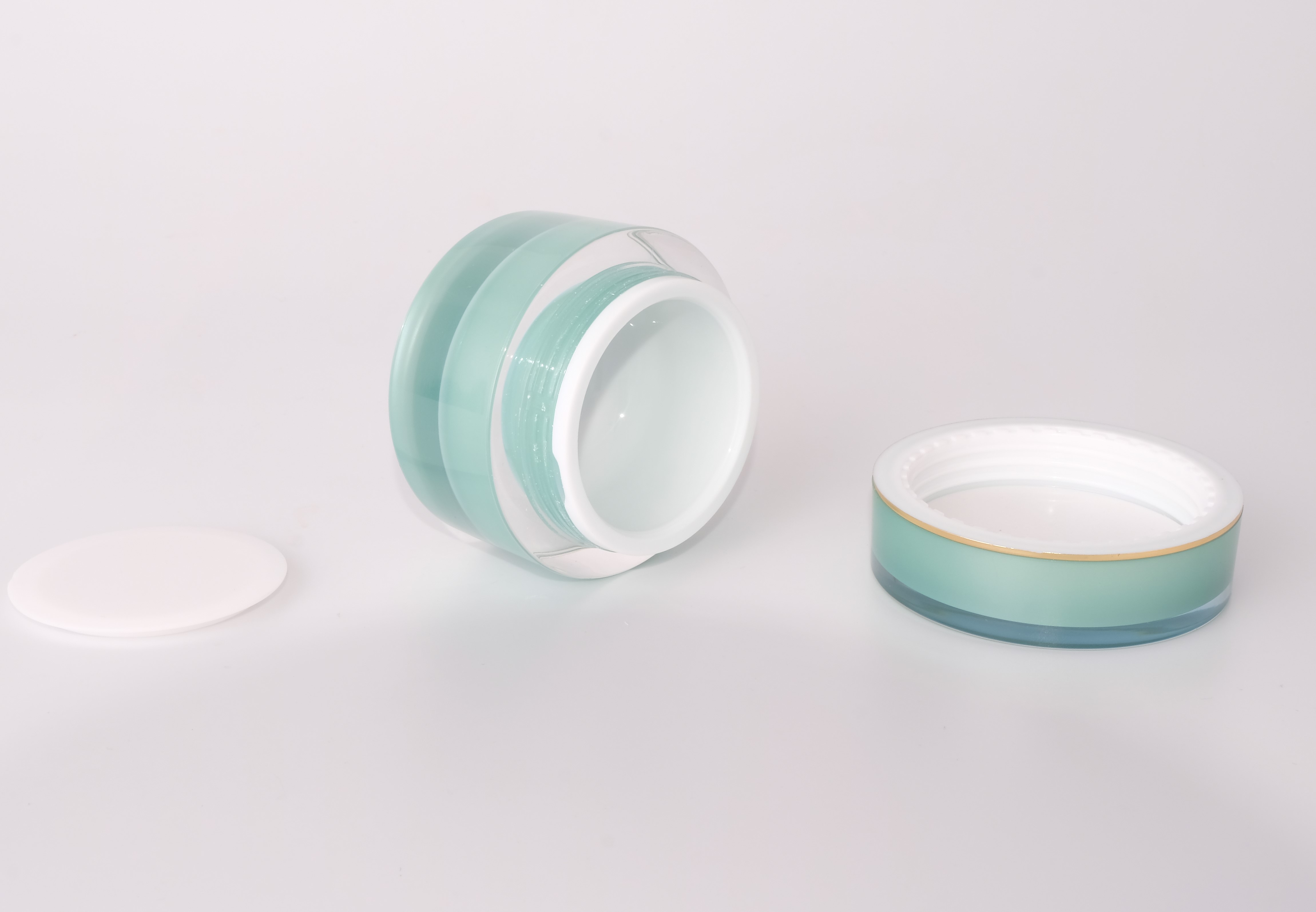 E12 50g in stock ready to ship gold plated lid mint green round empty acrylic plastic basic cosmetic cream jar