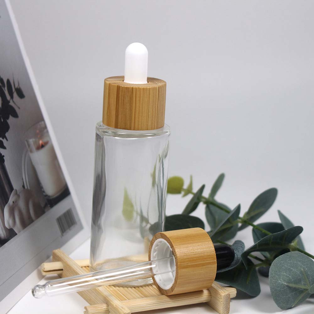 Eco Friendly Bamboo Cover clear Glass Dropper Bottle Cosmetic Pipette Essential Oil Empty Packaging Container 50ml