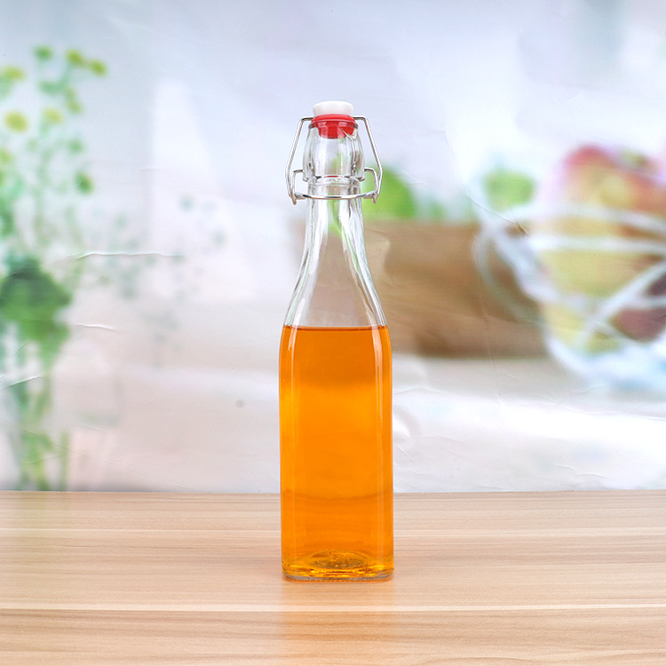 Eco Friendly Food Grade Clip Top Transparent Sealed Glass Beverage Bottles for Storage