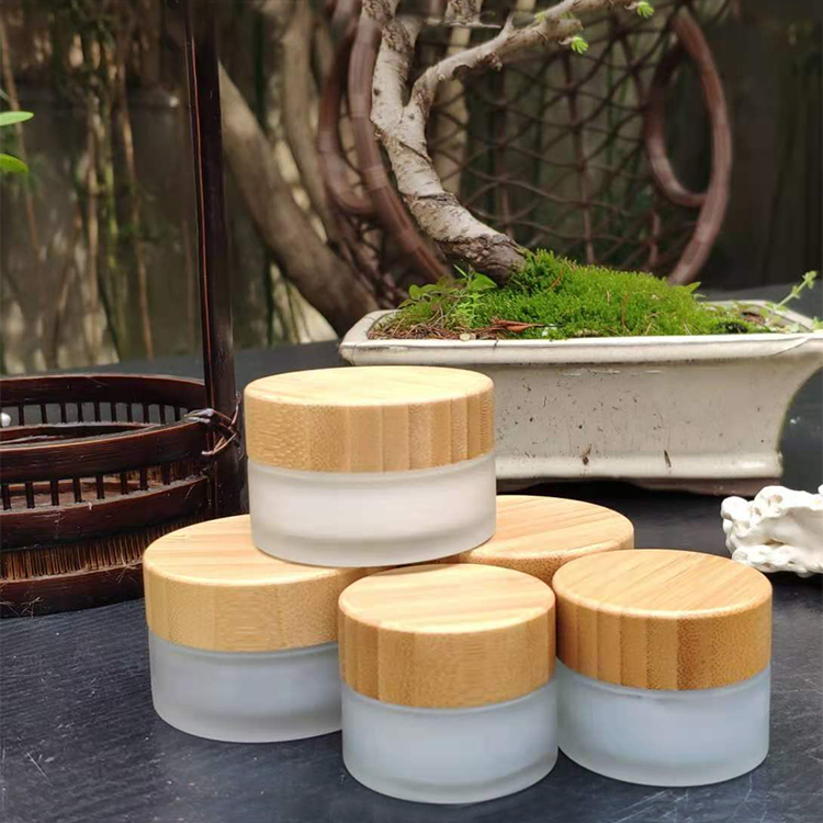 Eco friendly 30g 50g frosted transparent Refillable Glass Face Cream Pot Cosmetics Container Jar with bamboo cap