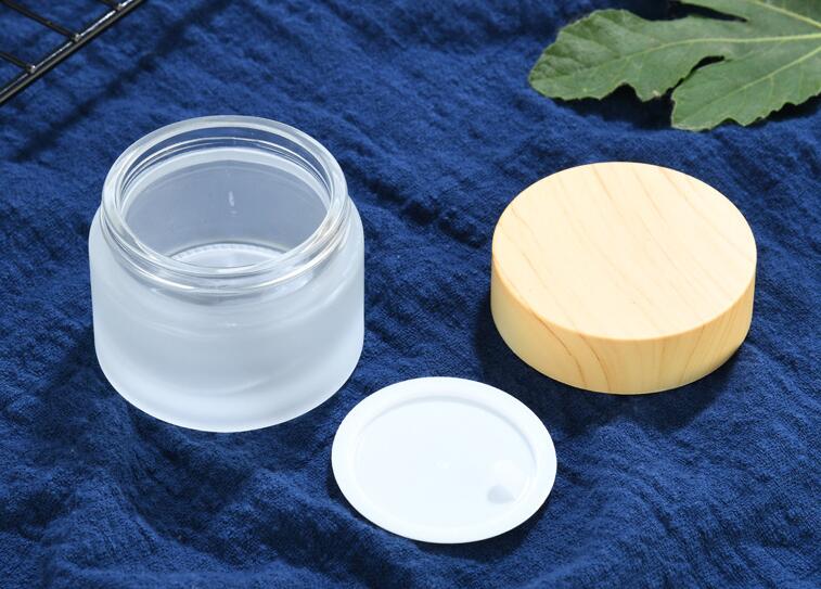 Eco friendly Frosted Glass Cream Jars Natural lids Empty Refillable Cosmetic Containers