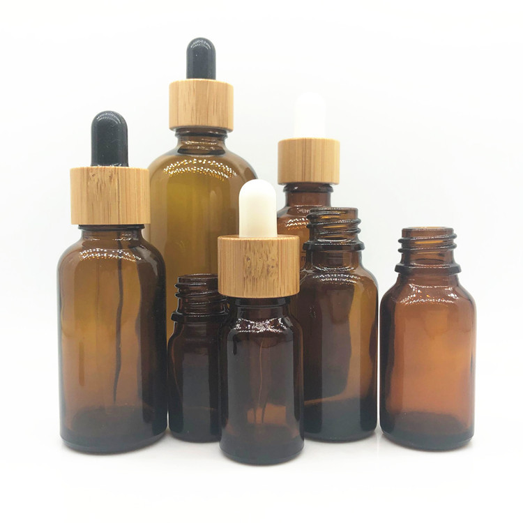 Eco friendly amber glass dropper bottles with bamboo cap lids 10ml 15ml 20ml 30ml 50ml 100ml