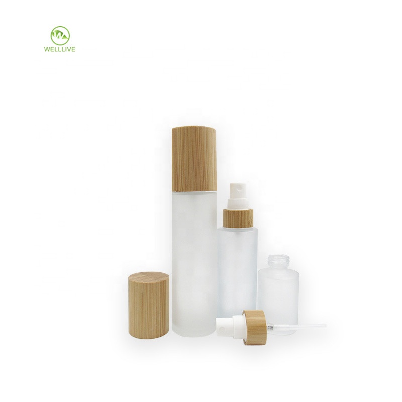 Eco friendly bamboo wood screw lid 30ml 1oz 2oz 4oz frosted glass pump perfume bottle with bamboo collar PP sprayer