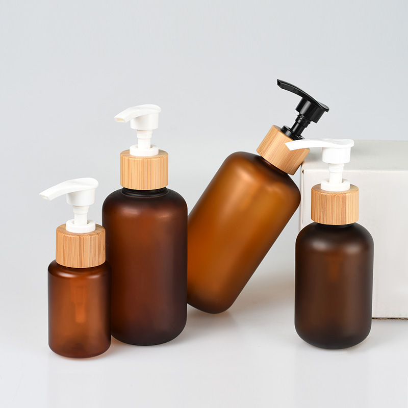 Eco-friendly cosmetic PET 30ml 60ml 120ml 250ml 500ml lotion frosted amber bottle with bamboo caps pump cap
